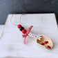 Sweet knit ladybug gnome with "lovebug" sign -Tiered tray decor